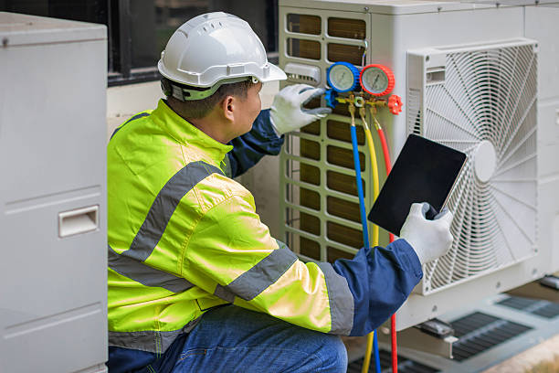 Professional Air Conditioning Repair technician working in Pompano Beach, FL
